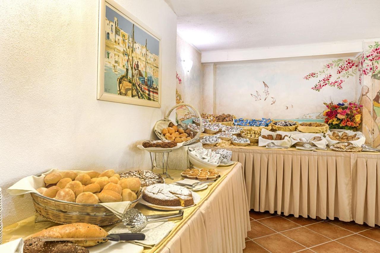 Colonna Beach Hotel Marinella Bagian luar foto